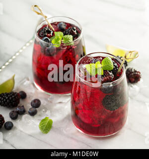 Summer berry drink with lime Stock Photo