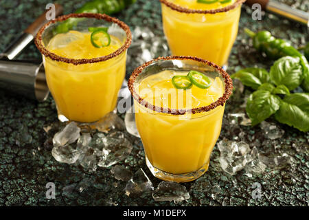 Spicy mango margaritas with hot pepper Stock Photo