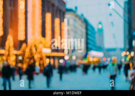 Helsinki, Finland. New Year Boke Lights Xmas Christmas Decoration And Festive Illumination In Aleksanterinkatu Street. Natural Defocused Blue Bokeh Ba Stock Photo