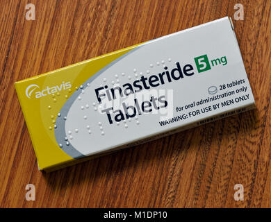 Pack of Finasteride 5mg. Tablets. 28 tablets for oral administration only. WARNING:FOR USE BY MEN ONLY. Actavis. Stock Photo