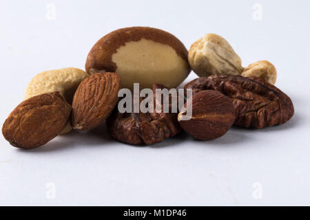 Mixed nuts isolated on a white background Stock Photo