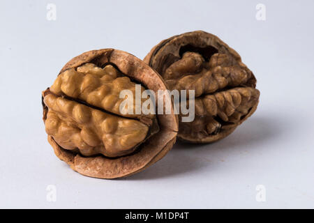 Walnuts in shell isolated on a white background Stock Photo