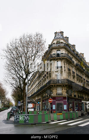 French apartment buildings and shop fronts around rochechouart in Paris Stock Photo