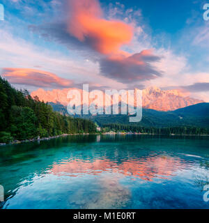 Fantastic sundown on mountain lake Eibsee Stock Photo