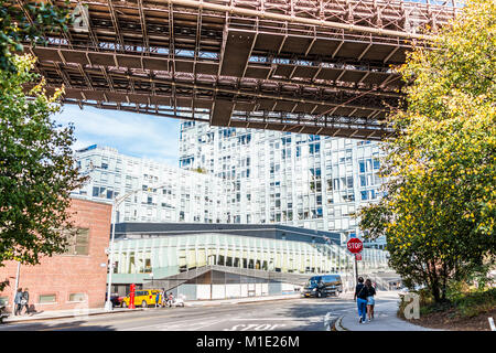 Brooklyn, USA - October 28, 2017: View of under Brooklyn Bridge outside exterior outdoors in NYC New York City, pedestrians people, cars traffic Stock Photo