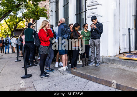 Brooklyn, USA - October 28, 2017: Long line queue of people crowd waiting for famous restaurant food called Grimaldi's Pizza Stock Photo