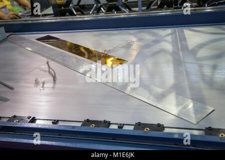 Scrap of plate on metal cutting machine Stock Photo