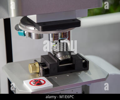 Bangkok, Thailand - November 22, 2017: Roughness evaluation of gear teeth surface by microscope in Metalex 2017 Stock Photo
