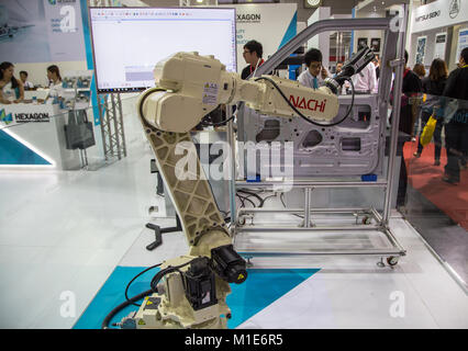 Bangkok, Thailand - November 22, 2017: Robot arm demonstrate spot welding car door in Metalex 2017 Stock Photo