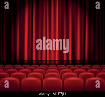 Theater or cinema stage with closed red curtain and soffit with ...