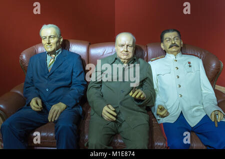 Wax statues of World War II leaders Roosevelt, Churchill and Stalin at the Krakow Wax Museum - Cracow, Poland. Stock Photo