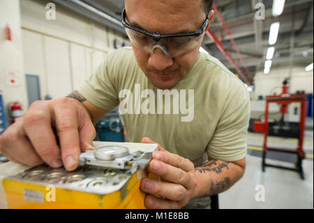 A member of the 48th Equipment Maintenance Squadron aircraft metals ...