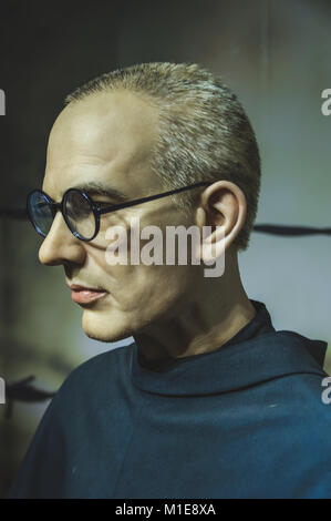 Wax statue of St Maximilian Maria Kolbe at the Krakow Wax Museum - Cracow, Poland. Stock Photo