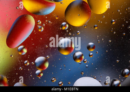 Abstract image with colorful circles and shapeless bodies on a colored background. Stock Photo