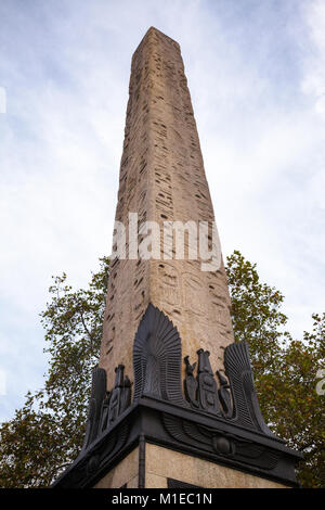 Ancient granite Cleopatra's Needle Egyptian obelisk with Egyptian inscriptions on Victoria Embankment in City of Westminster London UK Stock Photo