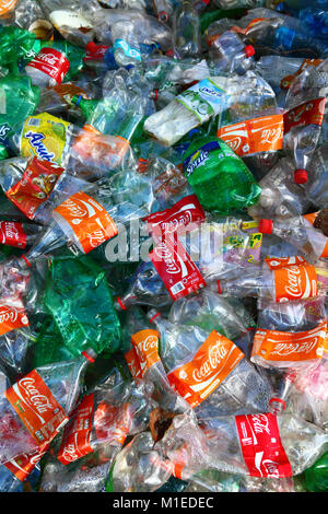 Detail of pile of flattened Coca Cola and other plastic fizzy drink bottles Stock Photo