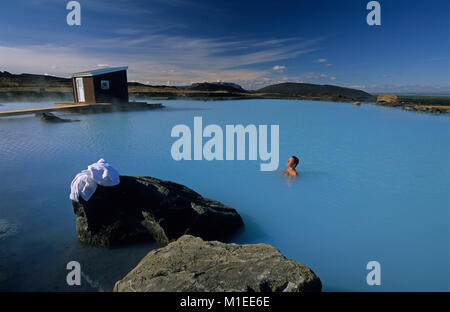 Iceland. Myvatn. Myvatn Nature Baths. Geothermal spa. Woman relaxing in geothermal spa, eyes closed. Stock Photo