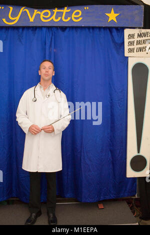 Steve Collison as 'Professor Van Burke' credited with keeping alive 'The Headless Lady'. Stock Photo