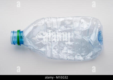 Single empty crushed plastic water bottle Stock Photo