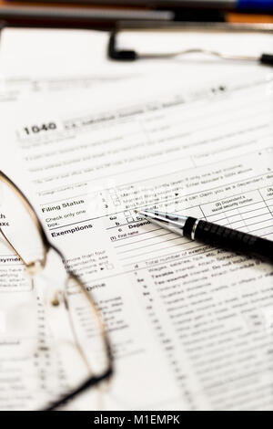 Closeup of US tax forms 1040. Useful as US tax background Stock Photo