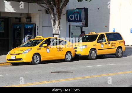 LOS ANGELES, USA - APRIL 5, 2014: Taxi drivers wait in downtown LA. There are 2,300 taxis in Los Angeles. Stock Photo