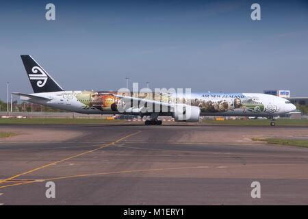 LONDON, UK - APRIL 16, 2014: Air New Zealand Boeing 777 with Hobbit movie livery after landing at London Heathrow airport. Air New Zealand carried 13. Stock Photo