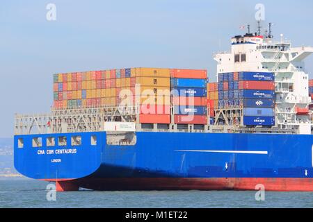 SAN FRANCISCO, USA - APRIL 8, 2014: CMA CGM Centaurius container ship sails in San Francisco bay. CMA CGM is the 3rd largest container shipping compan Stock Photo