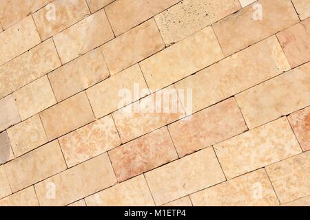 Egyptian sandstone wall background. Flat stone texture abstract. Stock Photo
