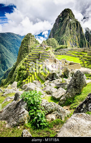 Machu Picchu, Peru - Ruins of Inca Empire city and Huaynapicchu Mountain, Sacred Valley, Cusco. Amazing place of South America. Stock Photo