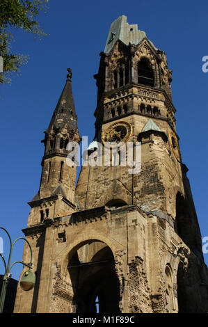 Germany. Berlin. Kaiser Wilhelm Memorial Church. 1891-1895. Built by Franz Heinrich Schwechten (1841-1924). Bombed during World War II, retains the ruined tower surrounded by buildings erected between 1951 and 1961. Stock Photo