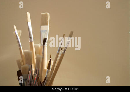 Artists paint brushes in pot Stock Photo
