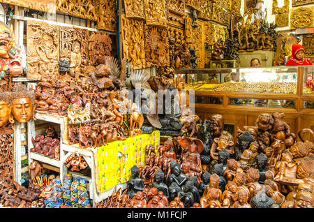 UBUD, BALI - MARCH 18: Typical souvenir shop selling souvenirs and handicrafts of Bali at the famous Ubud Market, Indonesia - Famous souvenirs at Ubud Stock Photo