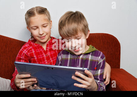 Modern children's entertainment - the game on a Tablet PC Stock Photo