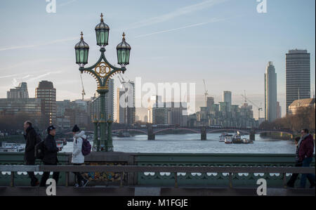 Westminster Bridge, London, UK. 30th Jan, 2018. UK Weather. UK Weather. Strong sunlight and frost greets morning commuters at rush hour on Westminster Bridge with views upstream towards Vauxhall. Credit: Malcolm Park/Alamy Live News. Stock Photo