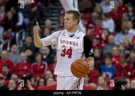 Wisconsin Badgers guard Brad Davison (34) shoots the ball during an ...