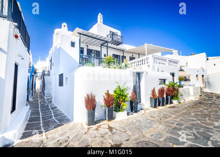 Mykonos, Greece. Whitewashed dotted alley in old city, Cyclades Greek Islands.