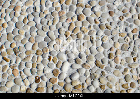 small brown white gray stones fine textured as background Stock Photo