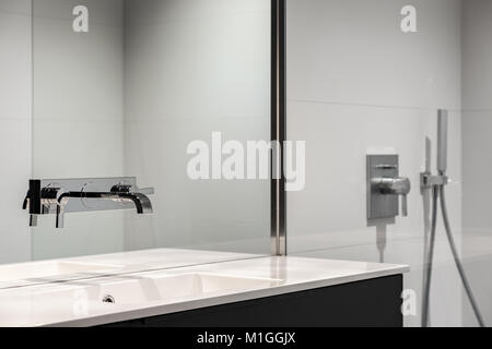 Elegant bathroom with modern and stylish basin and shower Stock Photo