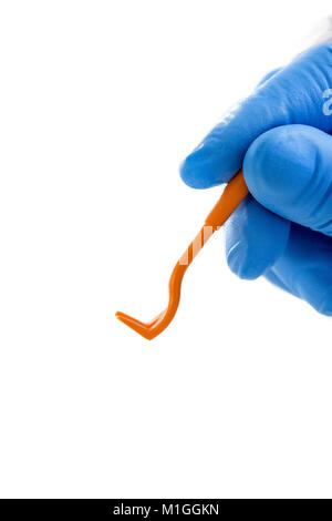 veterinarian's hands poses with tweezers for removing ticks on white backgrough Stock Photo