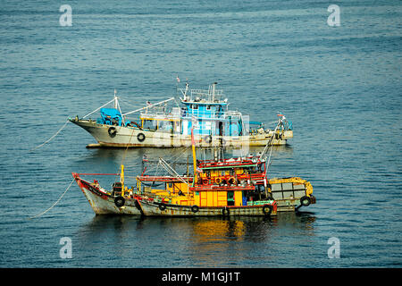Two trawlers moored on the waterfront of Kota Kinabalu, Sabah, Borneo, Malaysia Stock Photo