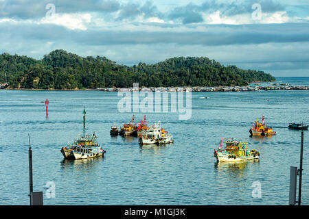 View from Kota Kinabalu waterfront with a traditional water village in the background, Sabah, Borneo, Malaysia Stock Photo