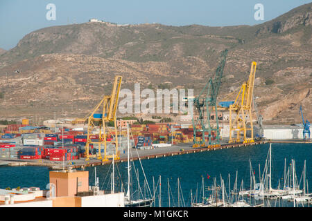 CARTAGENA, SPAIN - 28, 2016: Commercial cranes & shipping containers in the port of Cartagena Stock Photo