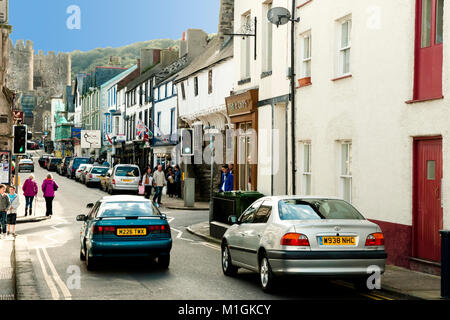 CONWY, WALES - October 6, 2012: Local traffic and shops on Castle Street Stock Photo