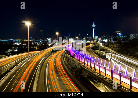 Light trails leading into Auckland City at Night Stock Photo