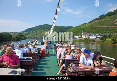 Tourists enjoying a boat trip on Moselle river, Kesten, Moselle river, Rhineland-Palatinate, Germany, Europe Stock Photo