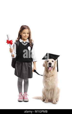 Full length portrait of a little schoolgirl with a diploma and a dog wearing a graduation hat isolated on white background Stock Photo