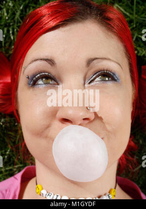 red head with bubble gum Stock Photo