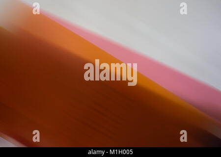 abstract background, diagonal colored lines and spots. Orange, gray, pink. Stock Photo
