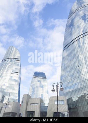 BAKU, AZERBAIJAN-DECEMBER 27, 2017: Modern architecture of Baku City, Azerbaijan. Flame towers is one of the most famous buildings in Baku. Stock Photo
