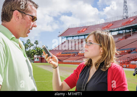 Miami Florida,Orange Bowl,football stadium demolition press conference,interview,interviews,interviewing,journalist,reporter,media,interview,interview Stock Photo